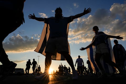 Fans of Uruguay arrive at the stadium